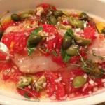 Into the oven goes Wild Red Snapper with caper berries, tomato, white win and shallots